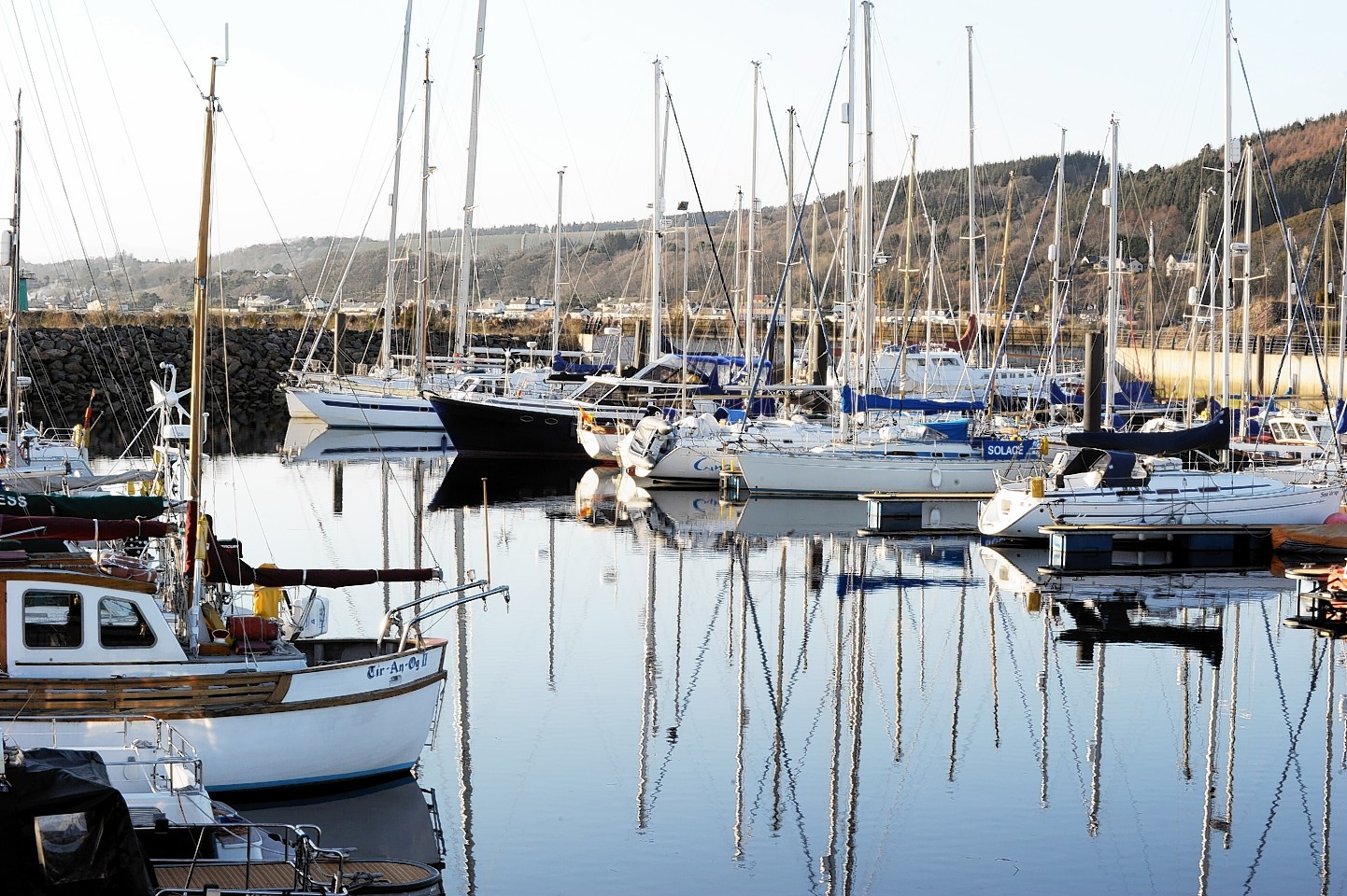 A man is in hospital after falling into the water at Inverness Marina.