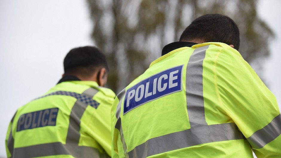 Police remain at the bar in the Torry area of Aberdeen