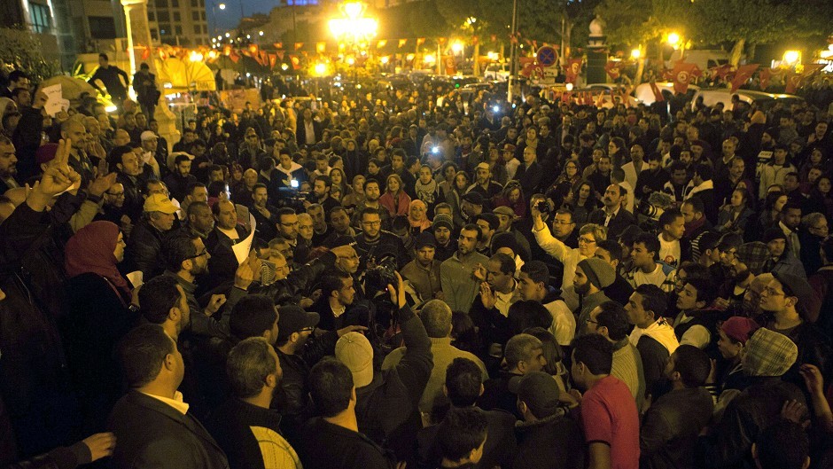 Tunisians gather at Habib Bourguiba avenue to show solidarity with the victims of the Tunis museum attack