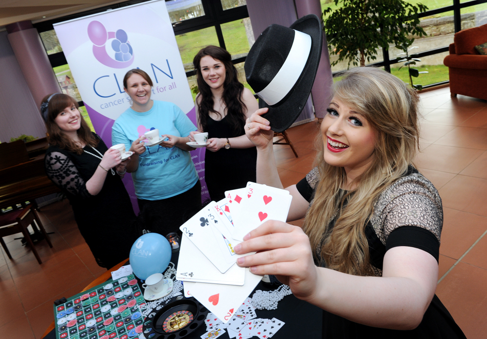 RGU events management students (from left) Jenni Chandler, Joanne Lamb and Jade Hough with Steph Dowling, CLAN fundraising co-ordinator, preparing for a 1920's style casino night fundraiser for CLAN organised by the students.