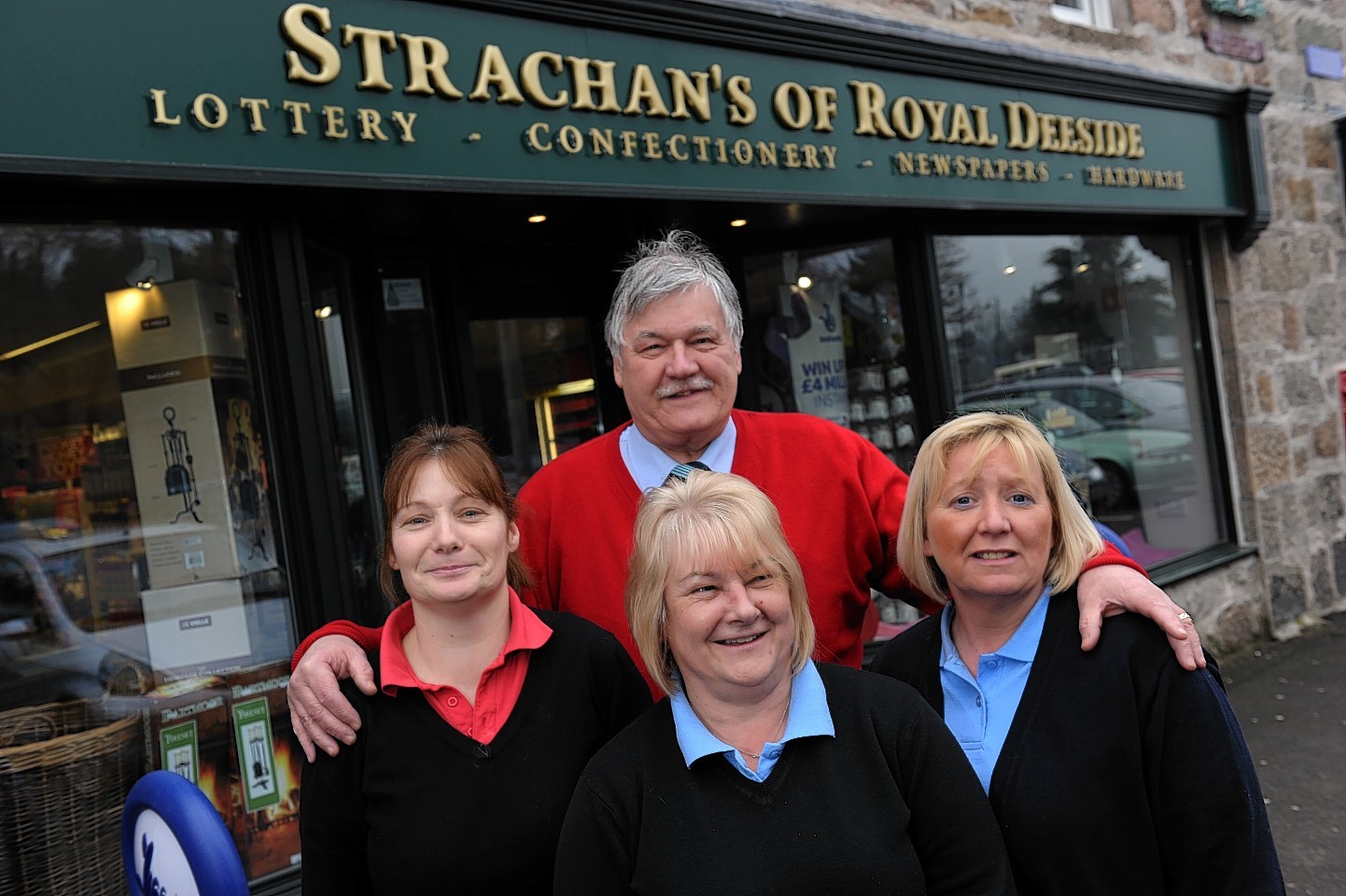 George Strachan with staff members Maria Sutton, Phyllis Taylor, and Julie Strachan. 
Picture by Kenny Elrick