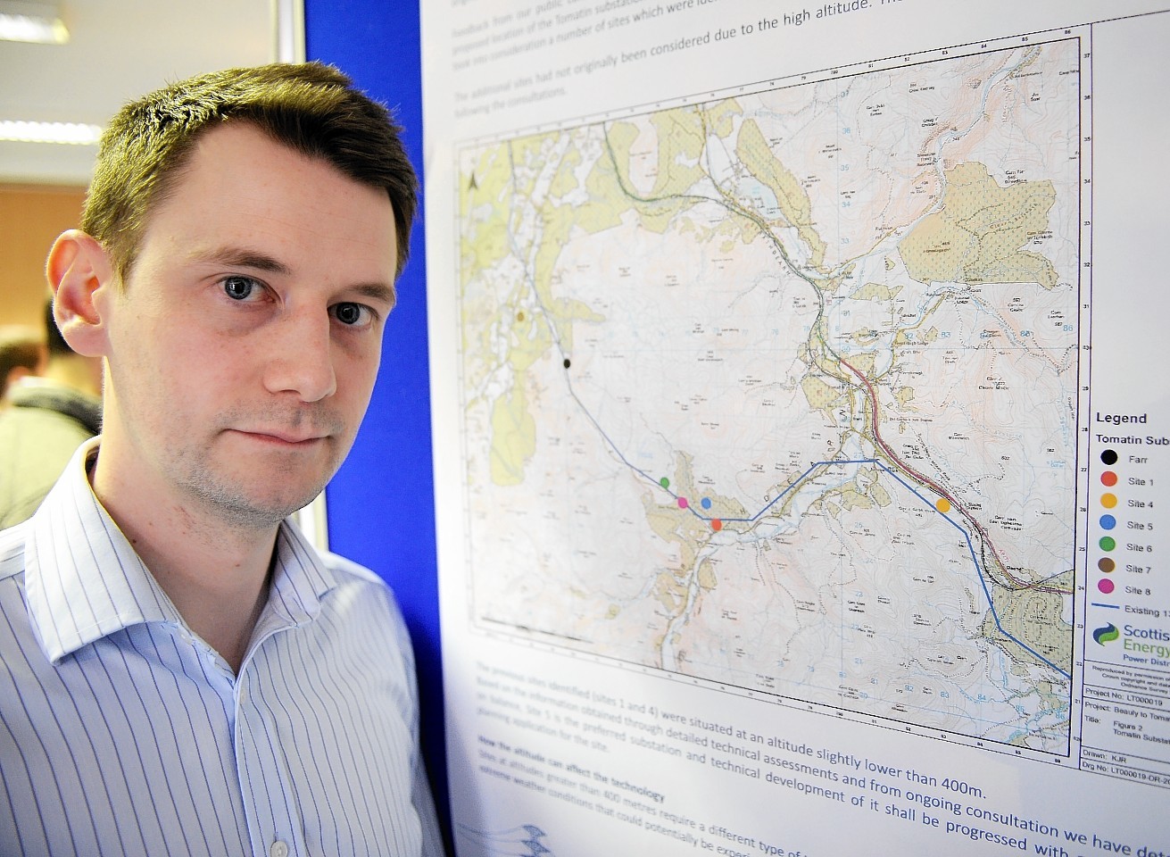 Shet's project manager Stephen McCall with a map of the Tomatin area