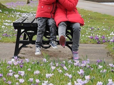Sophie and Zack Allan from Stonehaven get close to the crocus in the park