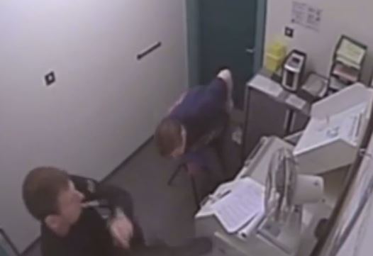 The video shows Robert Hutchinson falling over while trying to stand