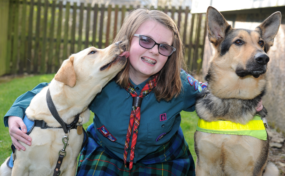 Eilidh and guide dogs Lester, left and Nelson, right.