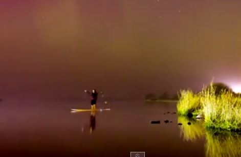 The footage shows the Northern Lights illuminating the sky overhead