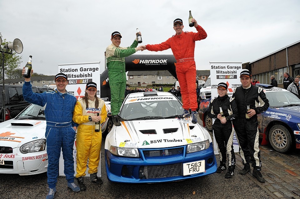 Barry Groundwater celebrates after Granite City Rally 2009 with Jock Armstrong, Kirsty Riddick, Mike Faulkner,  Peter Foy and Jude Wylie 
Picture by Kevin Emslie