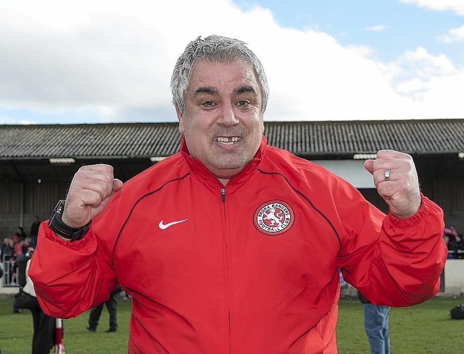 Brora manager Davie Kirkwood celebrates