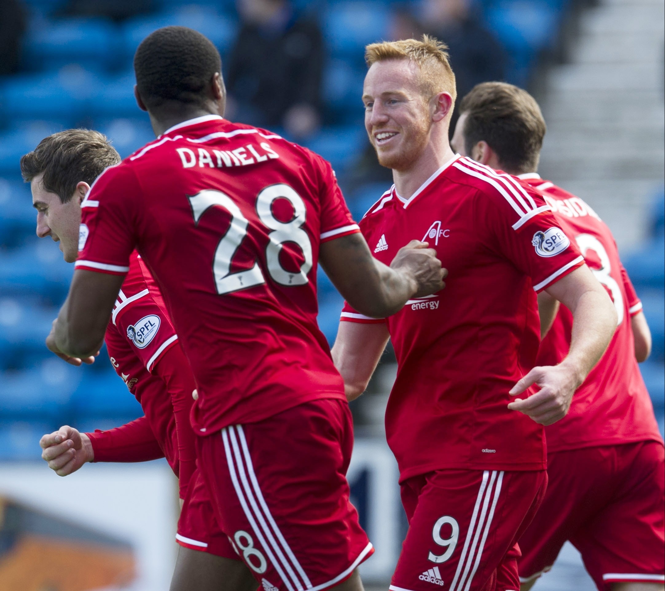 Adam Rooney and Don Daniels celebrate after the duo combined for Aberdeen's opening goal