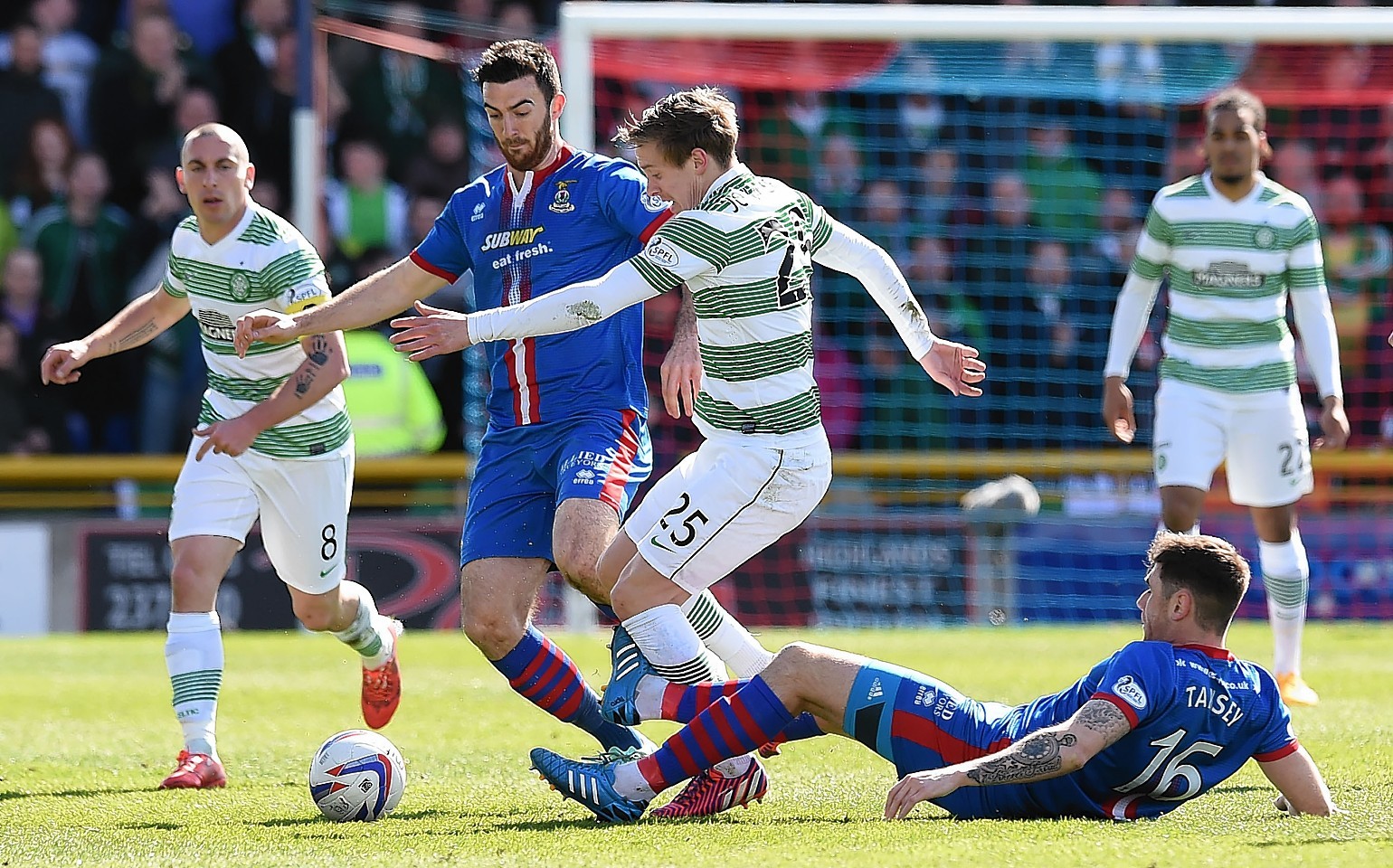 Ross Draper and Greg Tansey challenge Celtic midfielder Stefan Johansen