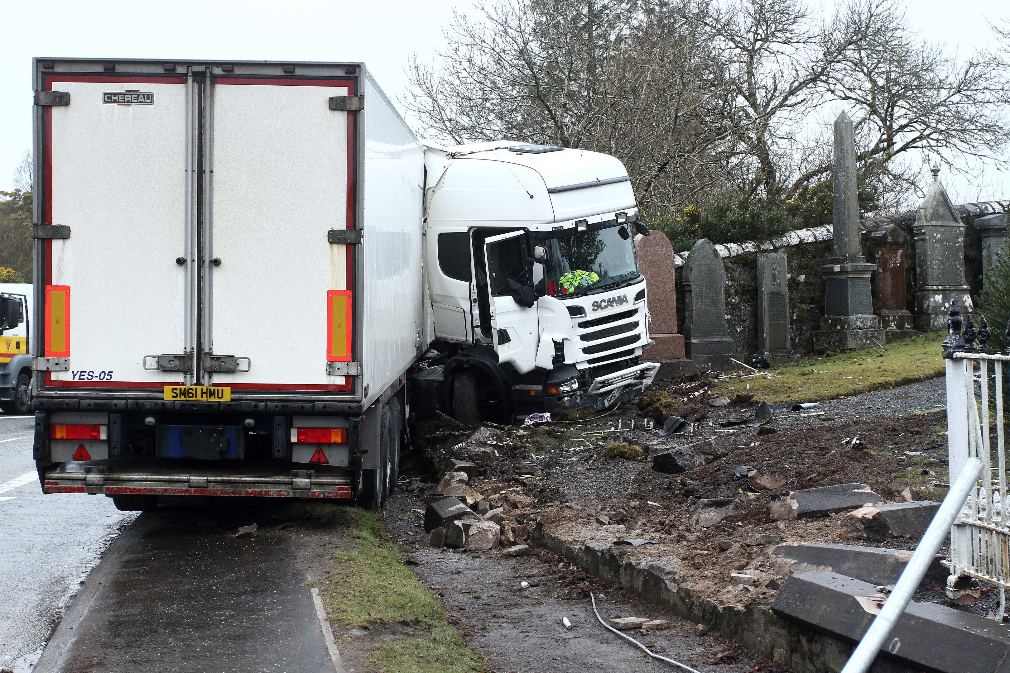The lorry has crashed into a cemetery in Oban, blocking the road
