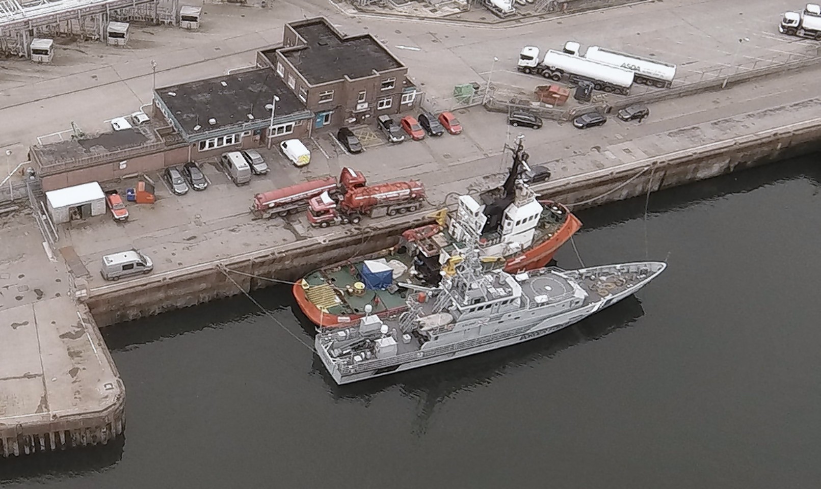 Borders Force HMS Valiant with Tanzanian-registered Hamal berthed at Aberdeen Harbour.