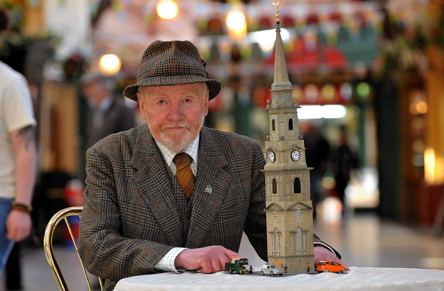 Hector MacDonald pictured with his model of Inverness Steeple