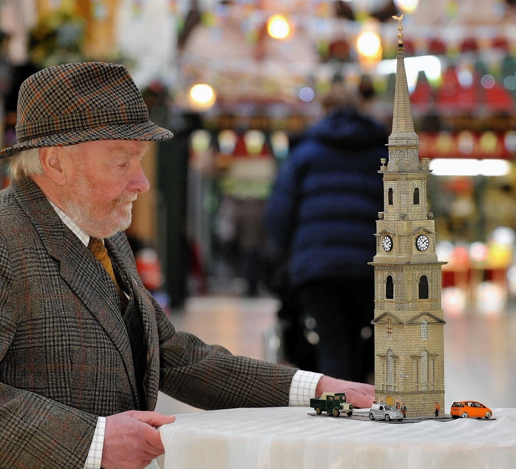 Hector MacDonald pictured with his model of Inverness Steeple