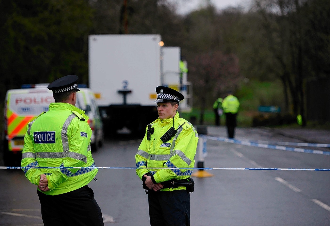 Police continue to search Dawsholm Park, Glasgow, April 15, 2015, where police say the hand bag of missing Irish student Karen Buckley, 24, was found