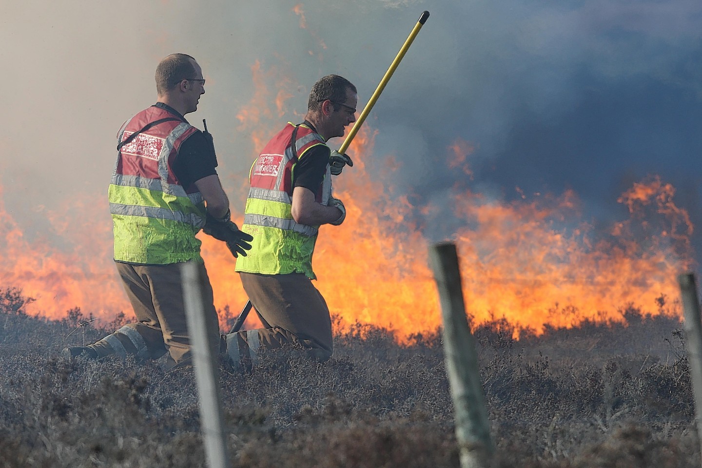 Firefighters tackle the large moorland fire near Inverness