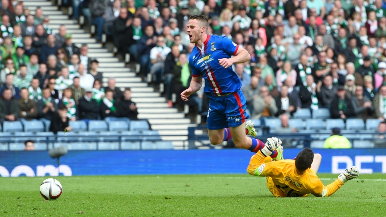 Marley Watkins is upended by Craig Gordon in the 2015 semi-final.