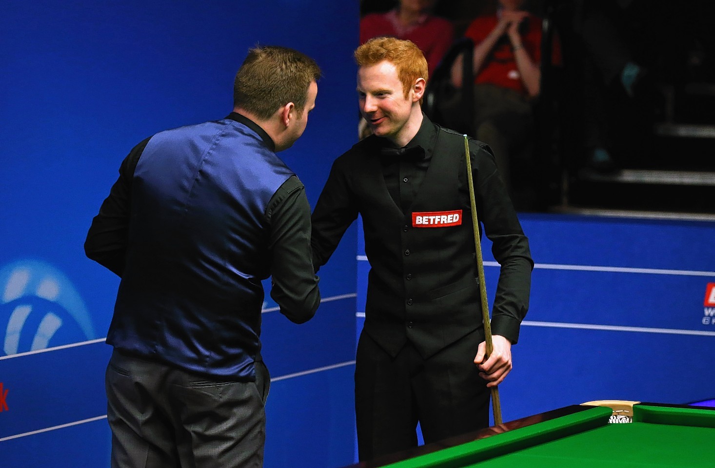 Shaun Murphy shakes hands with Anthony McGill