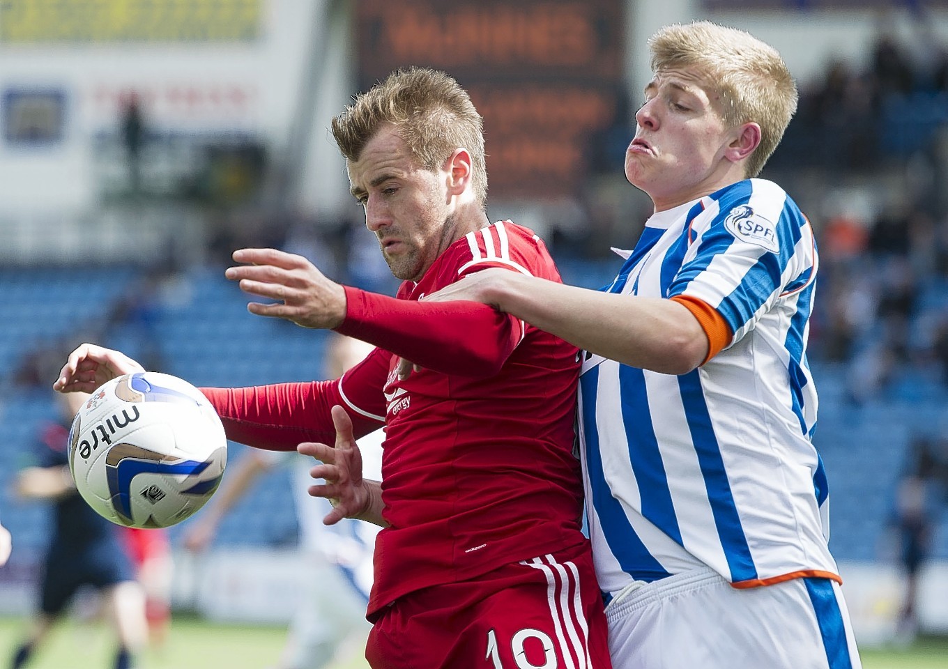 Niall McGinn fights for the ball against Kilmarnock in Aberdeen's 2-1 win
