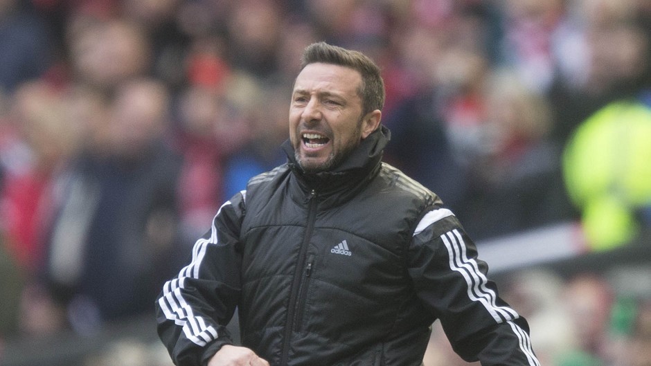Aberdeen manager Derek McInnes, pictured, has leapt to the defence of Dundee United counterpart Jackie McNamara