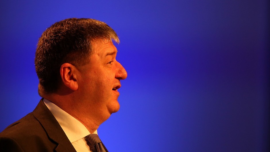 Alistair Carmichael has denied committing "any illegal practice" in court papers.