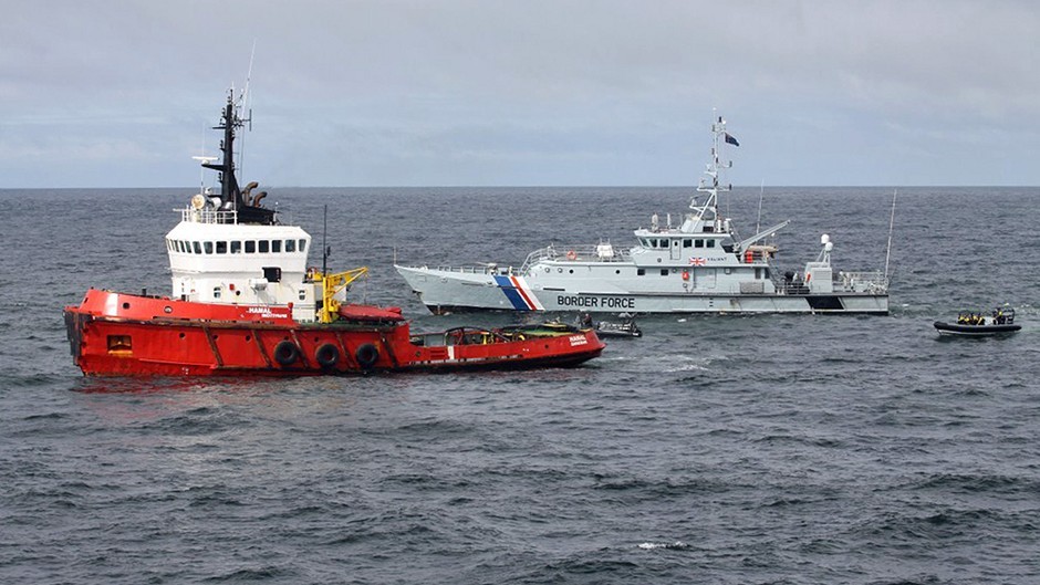 The MV Hamal, as it was intercepted by the frigate HMS Somerset and Border Force cutter Valiant about 100 miles east of the Aberdeenshire coast (NCA/PA)