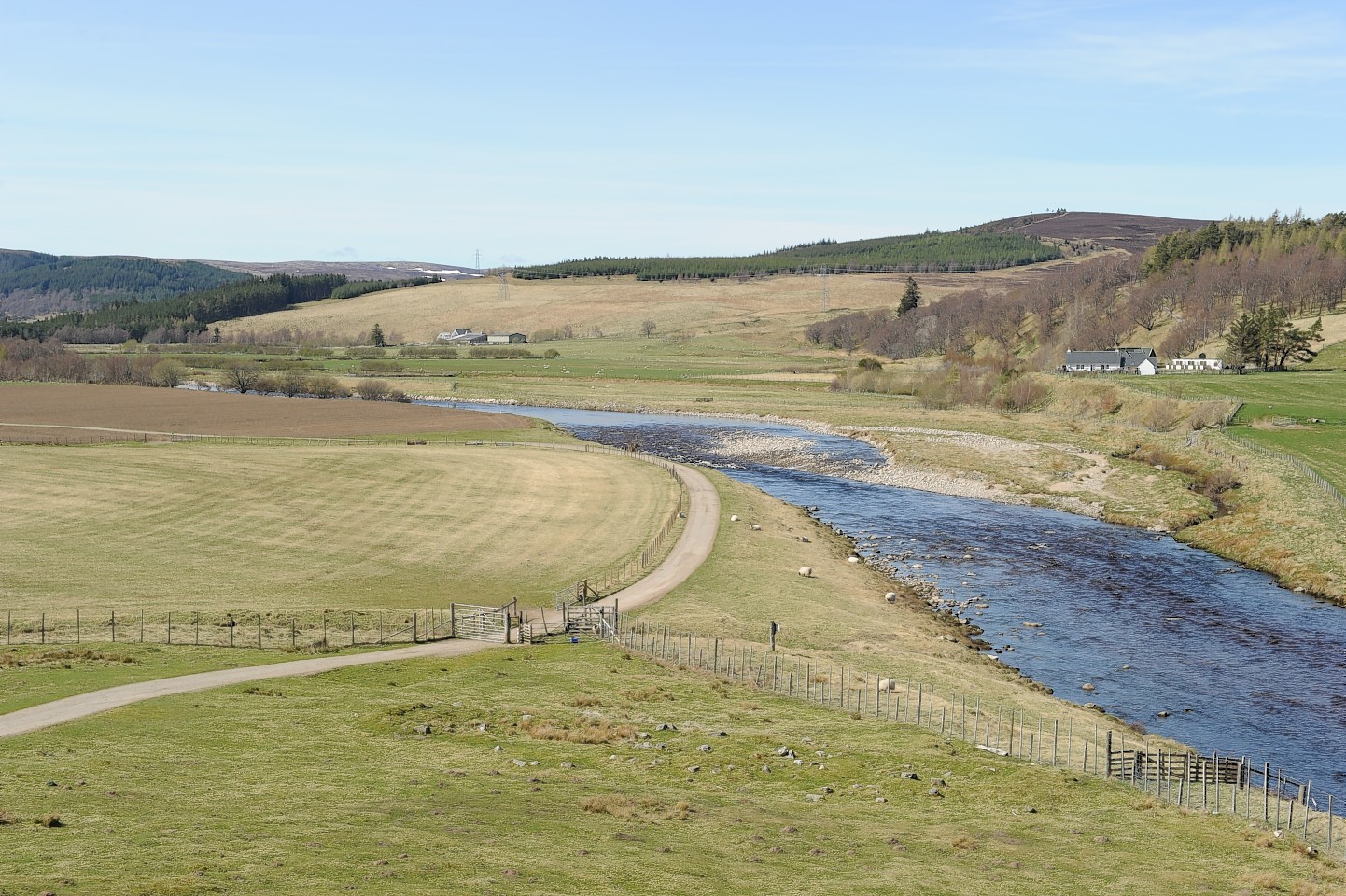 The River Findhorn with the Kylachie estate on the far bank. Permission has been given for a wind farm on the estate.