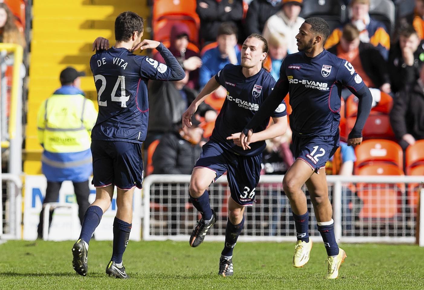 The Staggies goalscorers Rafa De Vita and Jackson Irvine celebrate netting against Dundee United