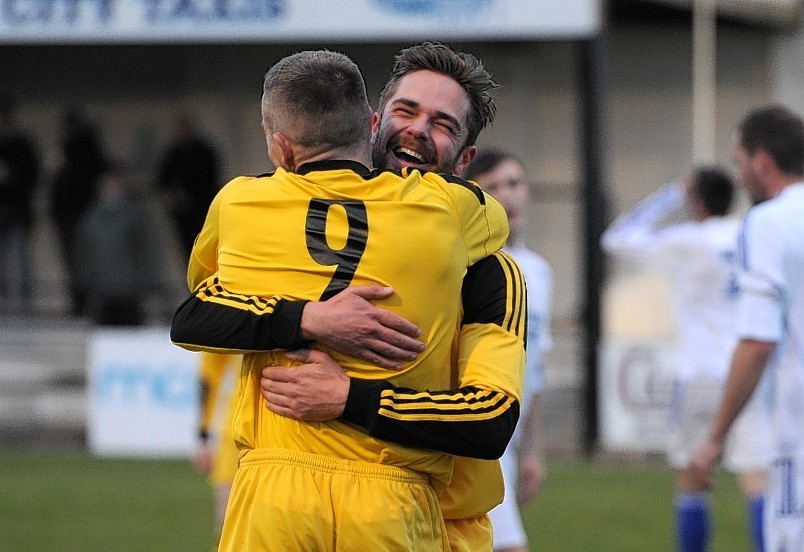 Cove's Stirling Smith and Daryl Nicol celebrate