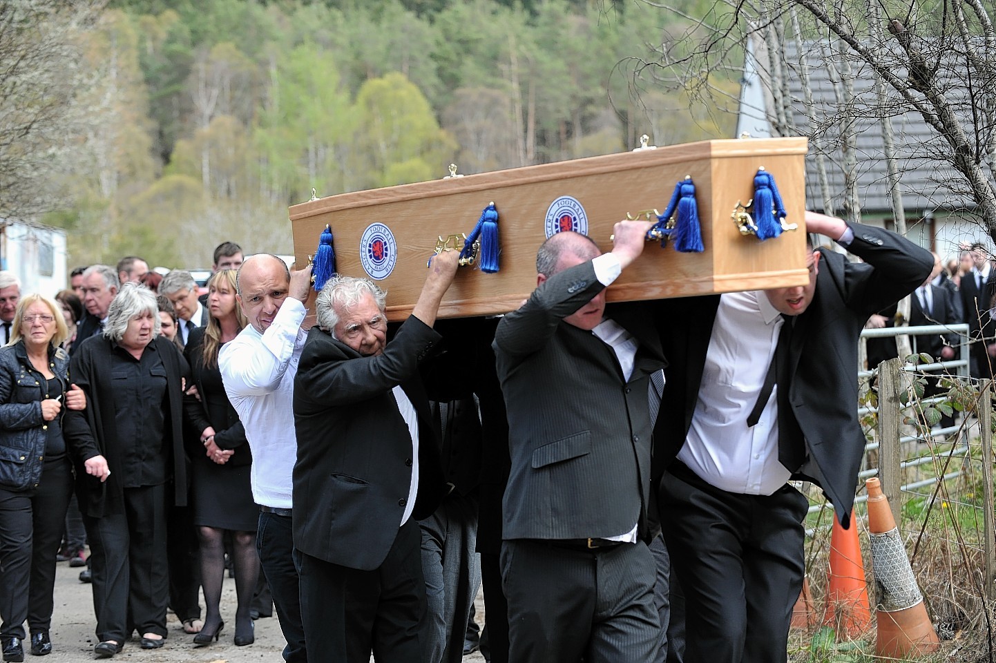The funeral of John Stewart, a young, disabled, traveller from Contin, who was taken from there by horse drawn hearse to his interment at Urray Cemetery, Muir of Ord.
Picture by Gordon Lennox
