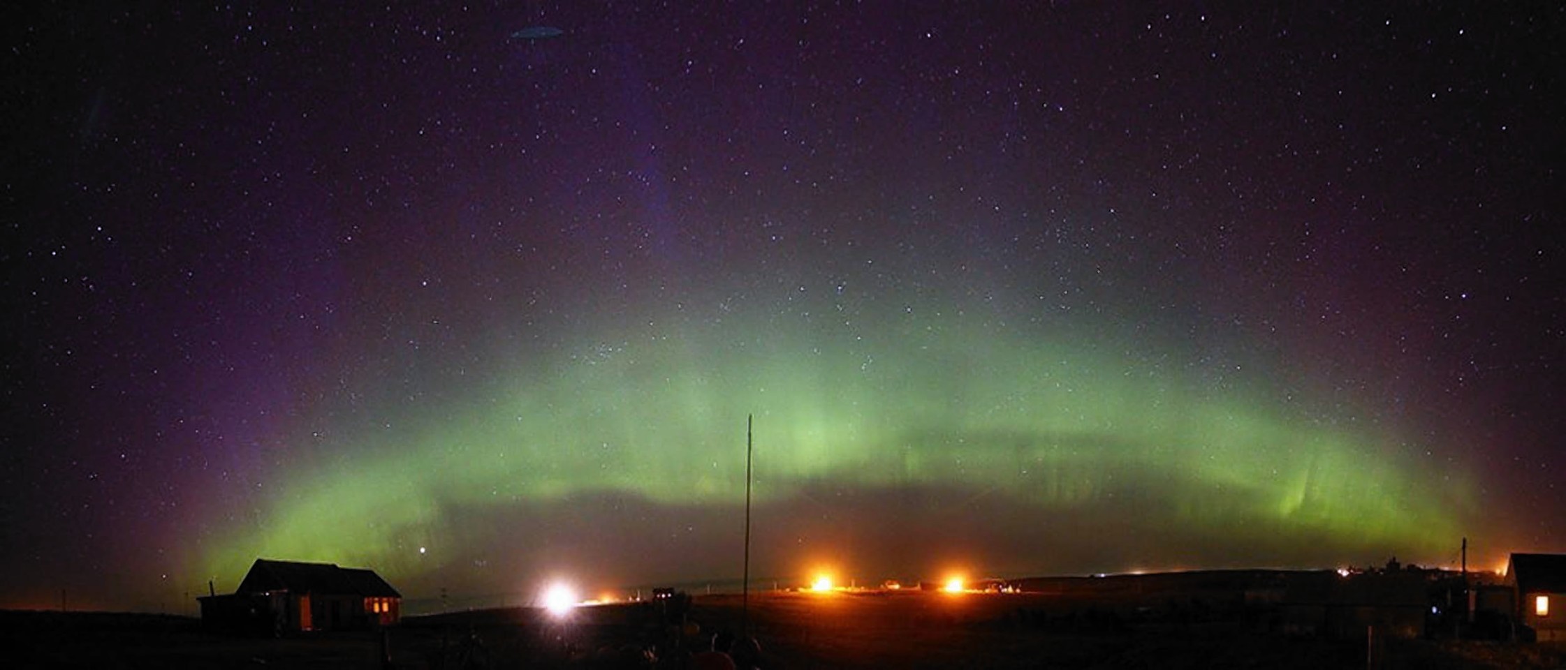 An aurora rainbow captured from the Isle of Lewis by photographer John Gray