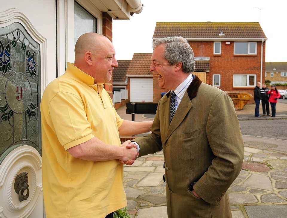 Ukip Leader Nigel Farage (right) meets local people on the campaign trail in Cliftonville, Kent at the weekend