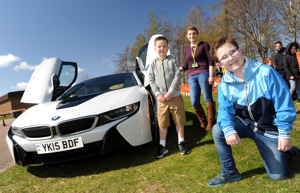 Fraser Adams, event organiser Emily Findlay and Oliver Constant enjoying fast car rides at Grampian Transport Museum in aid of the ARCHIE Foundation.