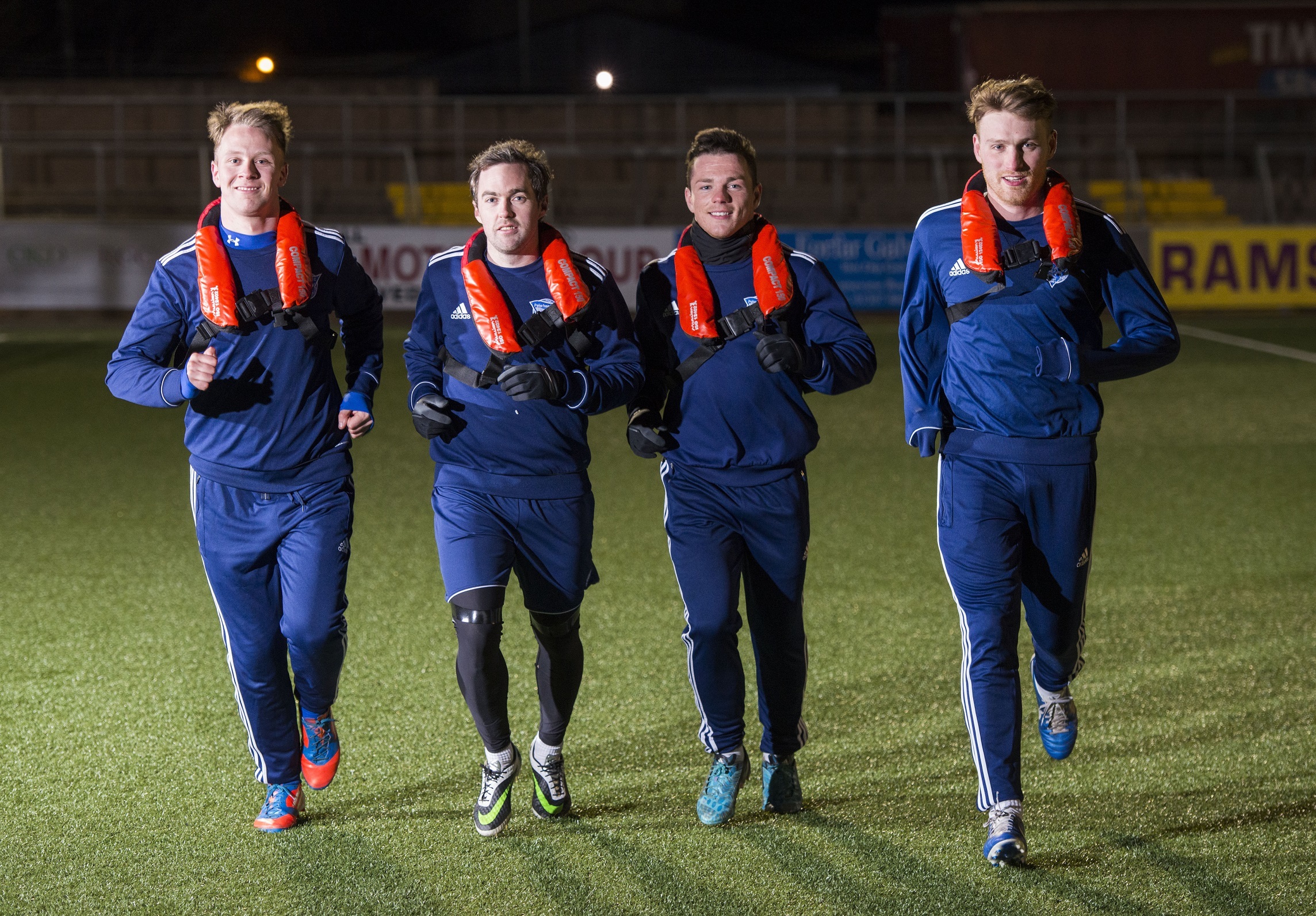 Pic Alan Richardson Dundee, Pix-AR.co.uk
Free to Use from Seafish
Peterhead FC Players  (ltoR) Ryan Strachan,Jamie Stevenson, David Cox and Rory McAllister train with the life preservers on