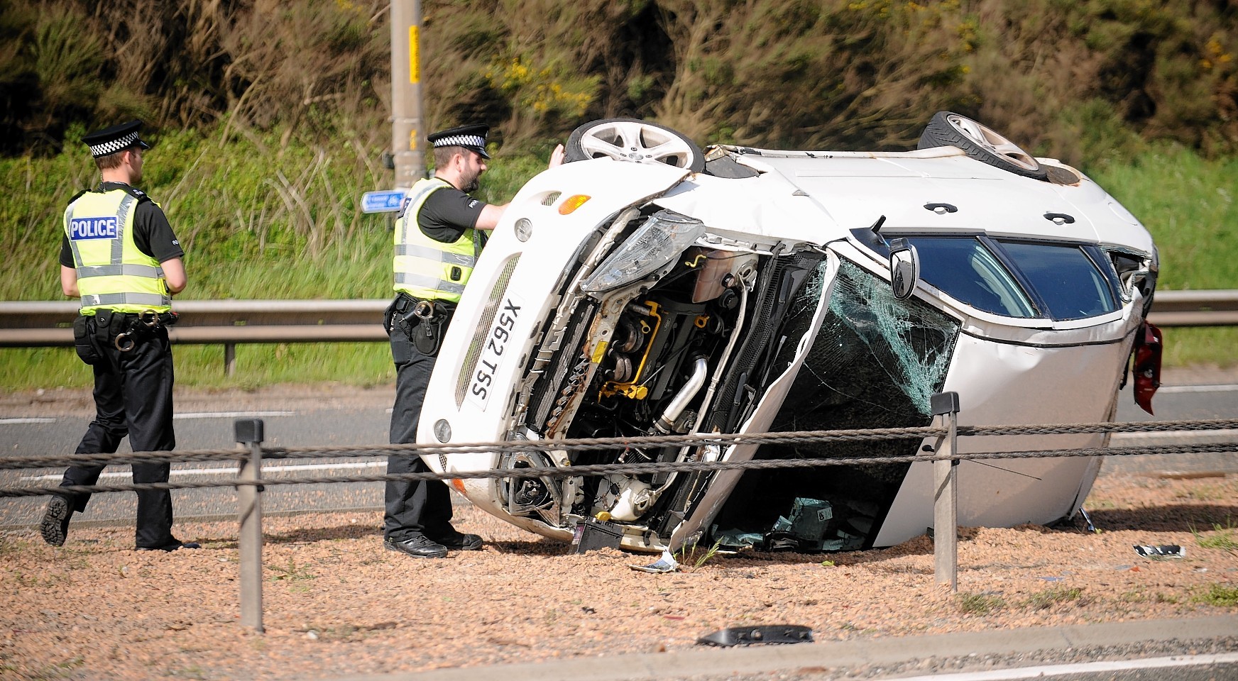 Police at the scene of  this afternoon's one car accient on the A9 at North Kessock which caused holdups for traffic in both directions during rush hour.