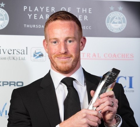 Adam Rooney with his award