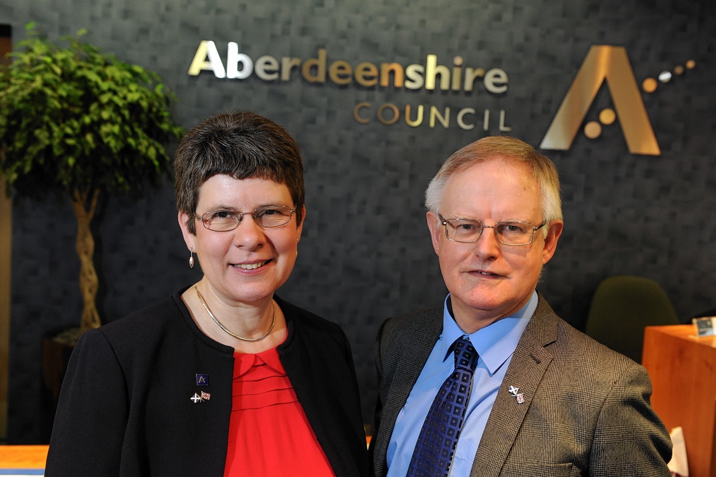 Labour councillors Alison Evison and Raymond Christie have quit Aberdeenshire Council's ruling administration