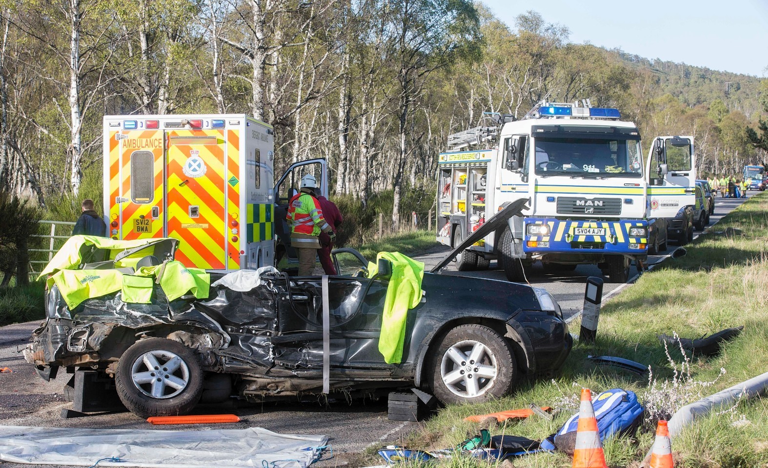 The Nissan X Trail and the ambulance after the collision at Dinnet