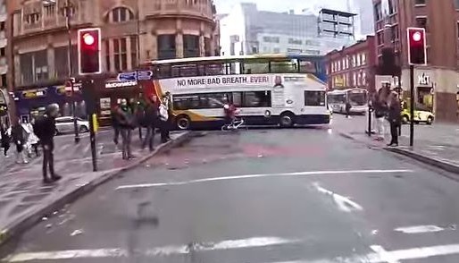 The bike and bus collide