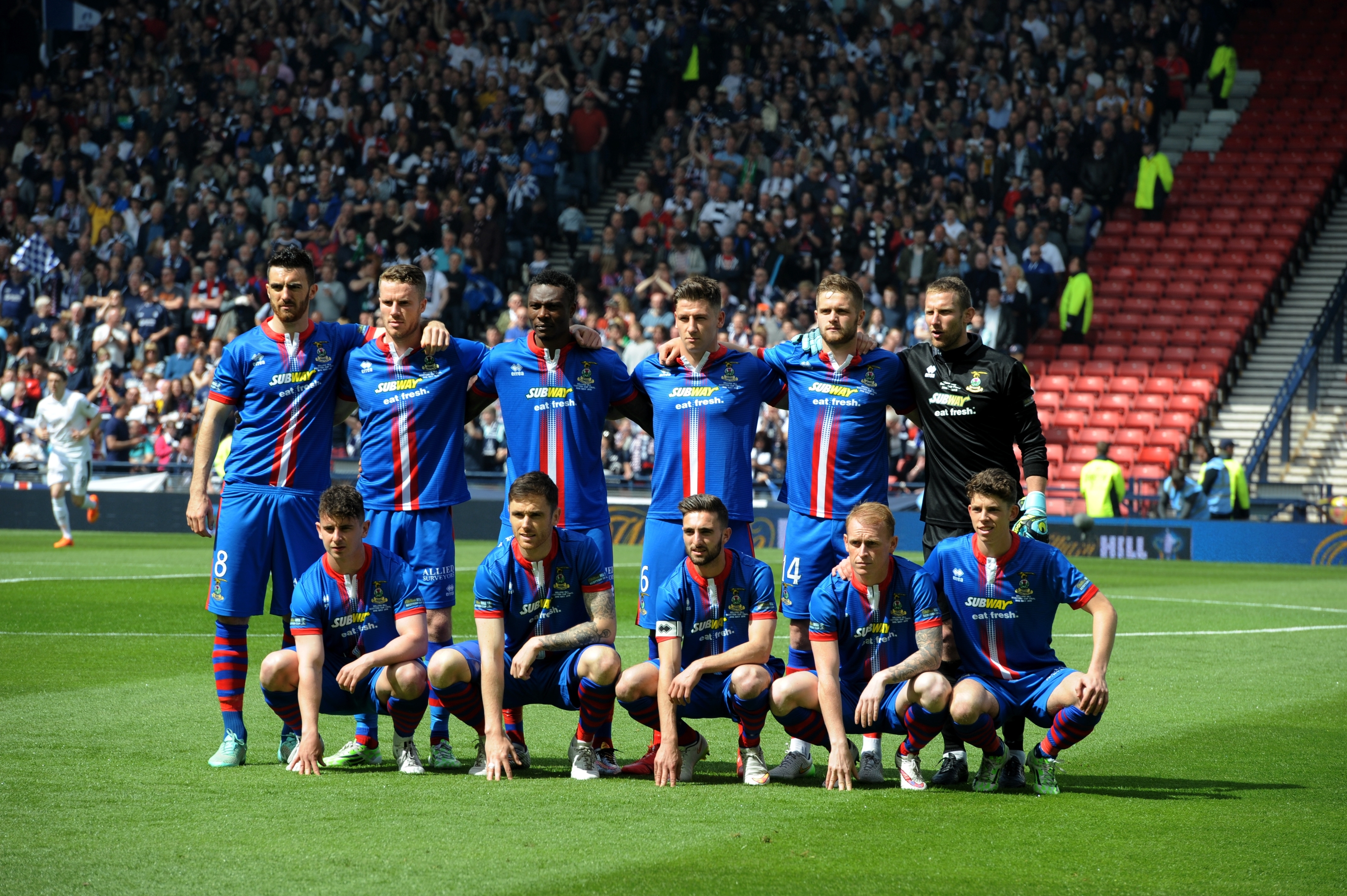 The Caley Thistle heroes line up ahead of the match. Picture by Kenny Elrick