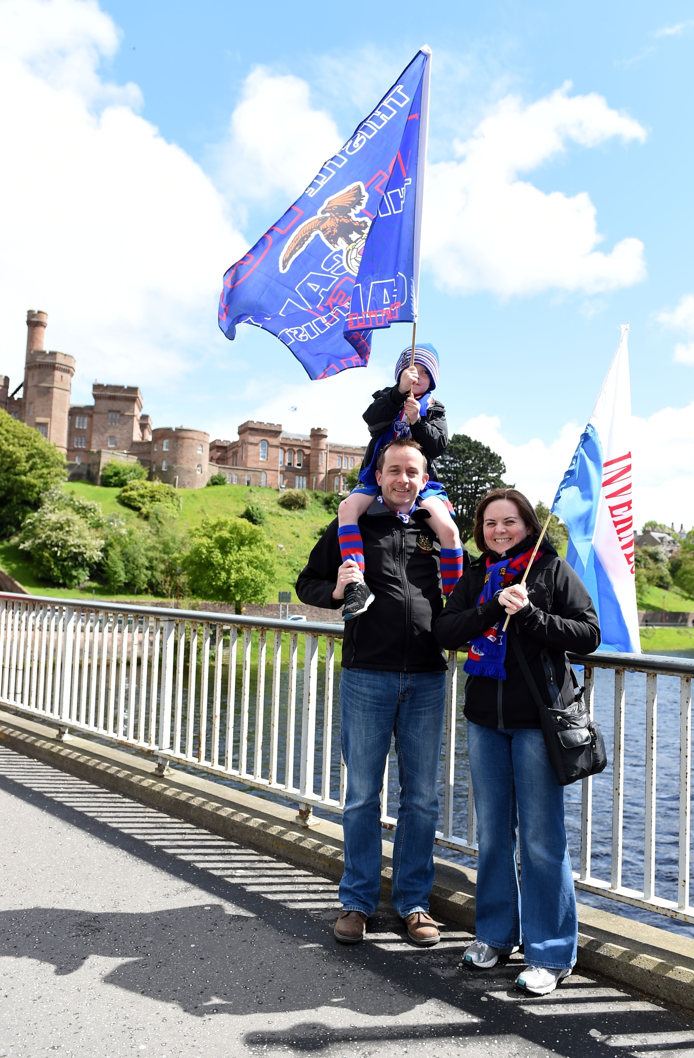 The ICT fans line the streets of Inverness this afternoon as they wait for a glimpse of the Scottish Cup trophy