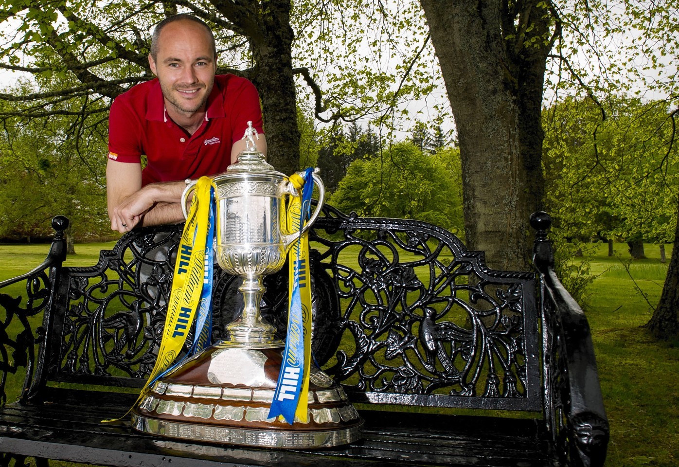 David Raven poses with the Scottish Cup