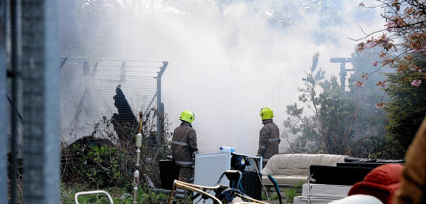 Firefighters tackle the blaze