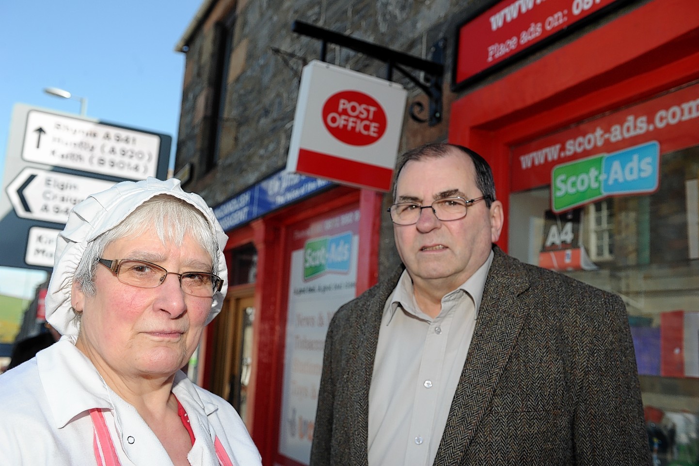 Bunty Campbell, left, chairman of Dufftown Community Council, and Moray councillor Mike McConnachie, right, outside Dufftown Post Office which closed suddenly. Picture by Gordon Lennox