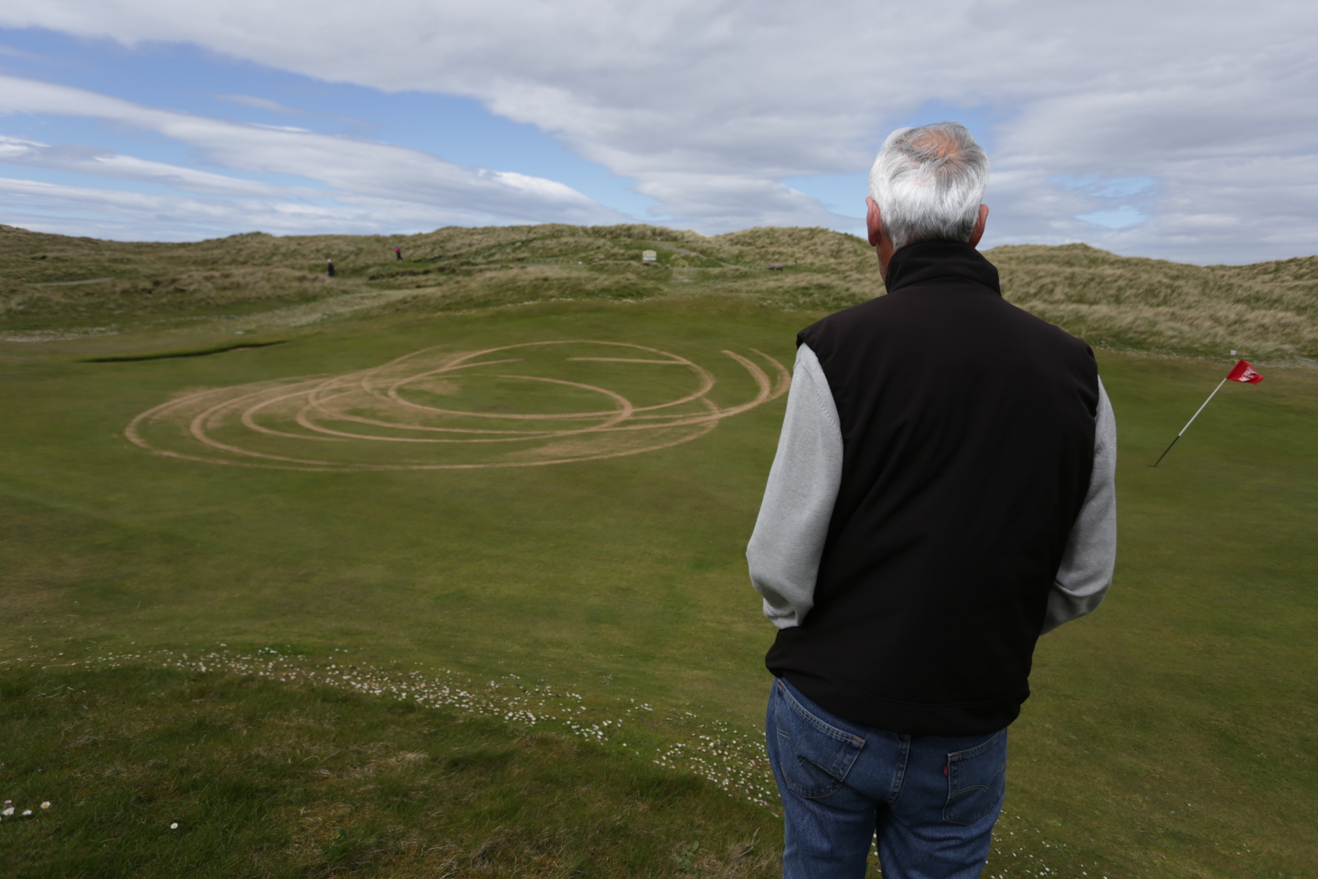 Gerry Chalmers looks out at the damage