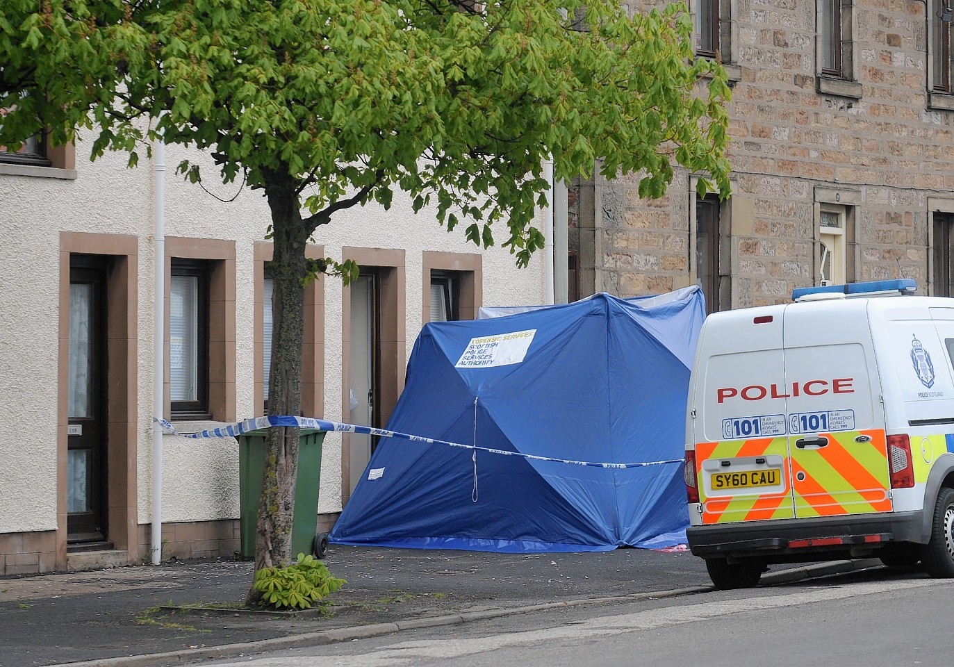 Police Scotland officers at the scene on Invergordon High Street at the incident which took place shortly before noon on Tuesday last week.