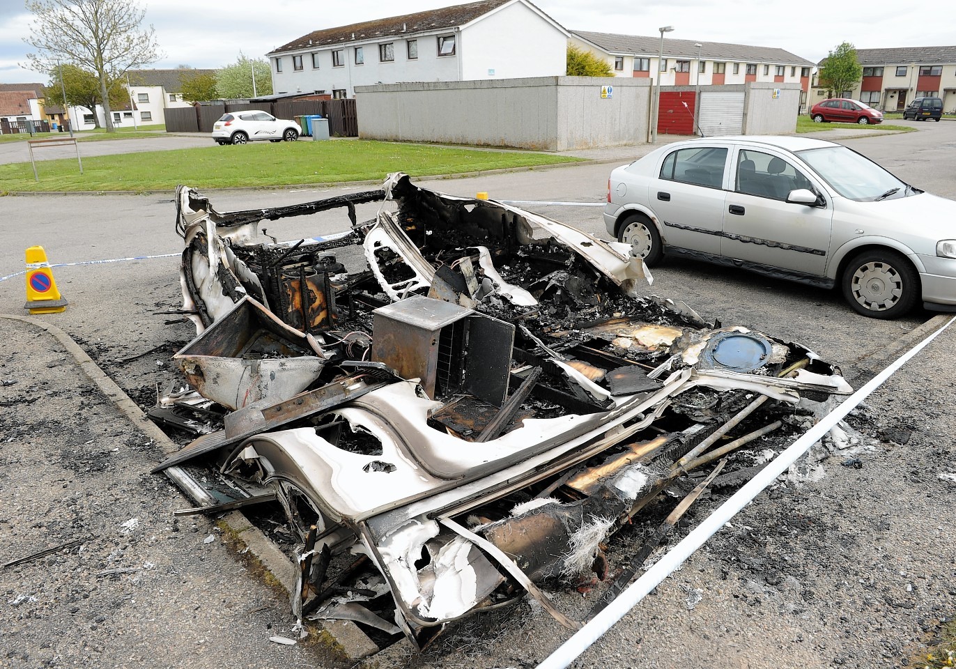 The burnt out remains of the caravan at Caberfeidh Drive, Invergordon