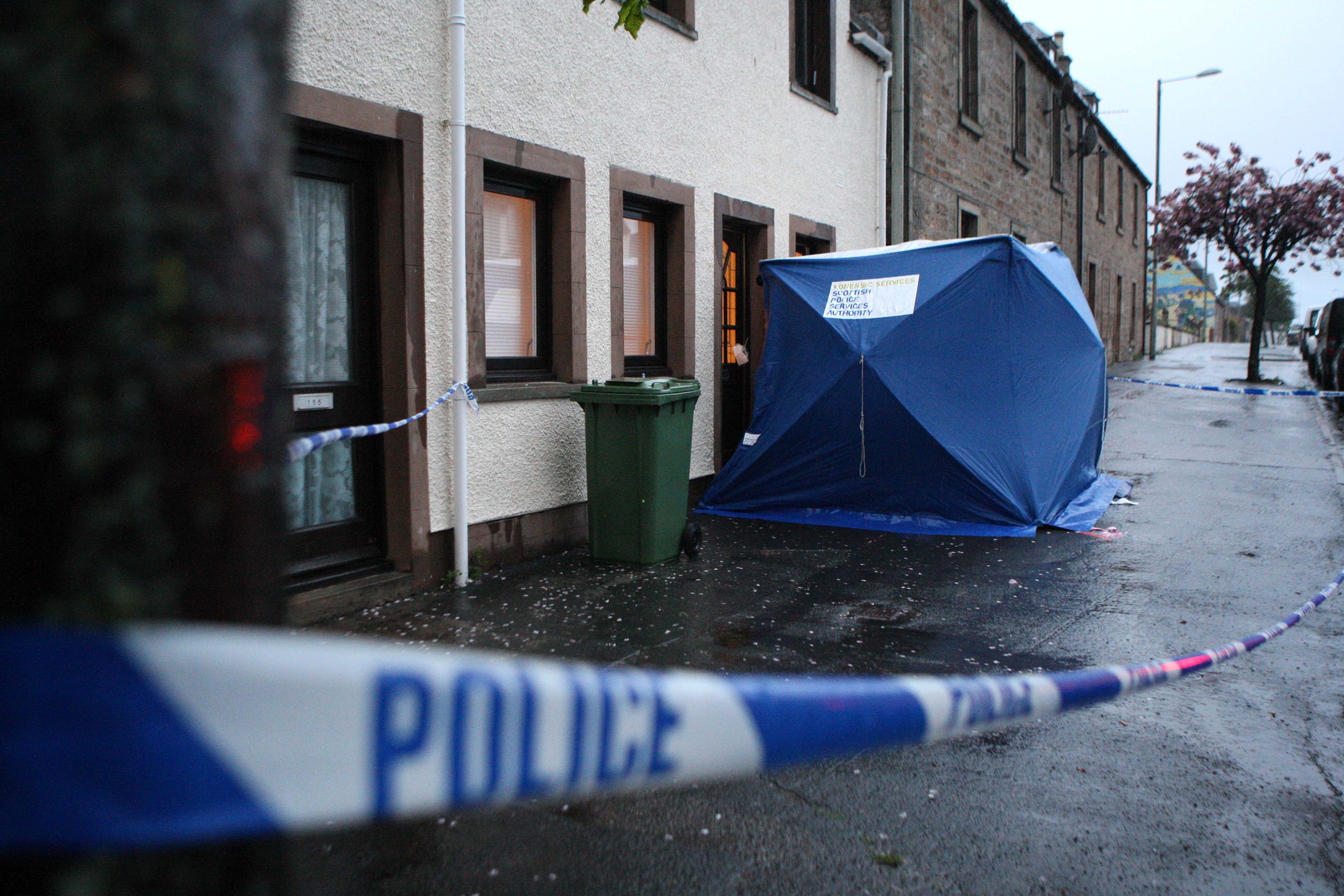 Scene of a stabbing outside number 157 on the high street in Invergorden. Picture: Andrew Smith