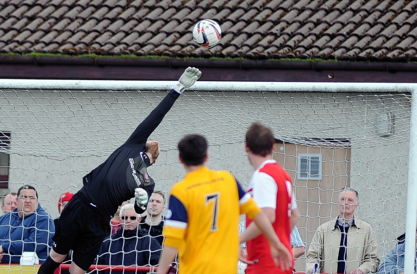 Malin  tips clear a Montrose effort in the first leg