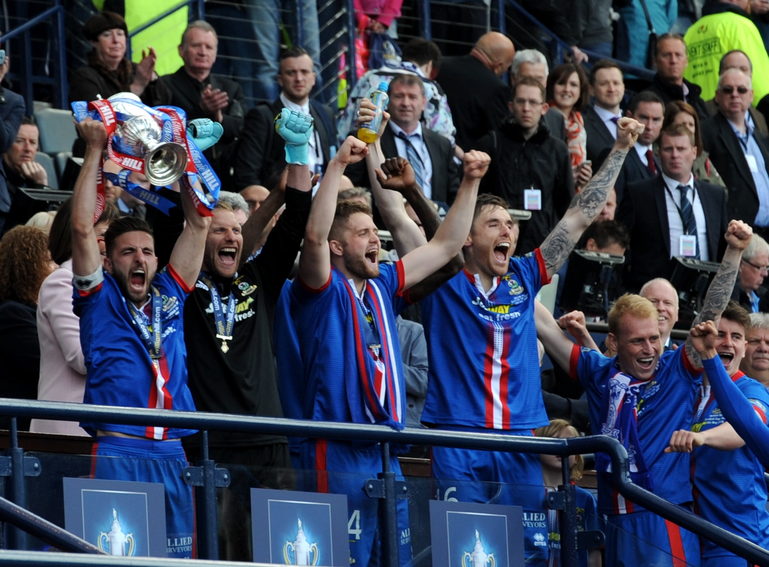 Caley Thistle are presented with the trophy. Picture by Kenny Elrick